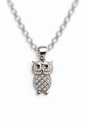 925 sterling silver owl pendant with sparkling stones and black eyes.