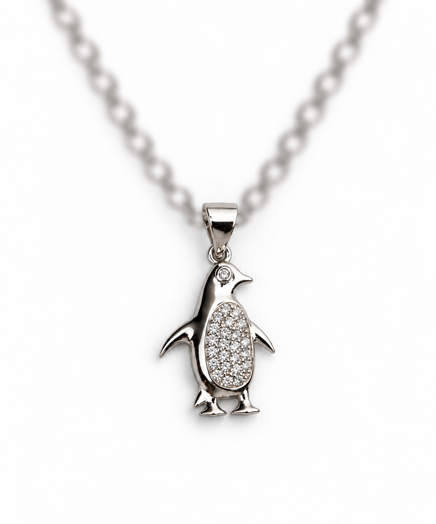 925 sterling silver penguin pendant with sparkling stones.