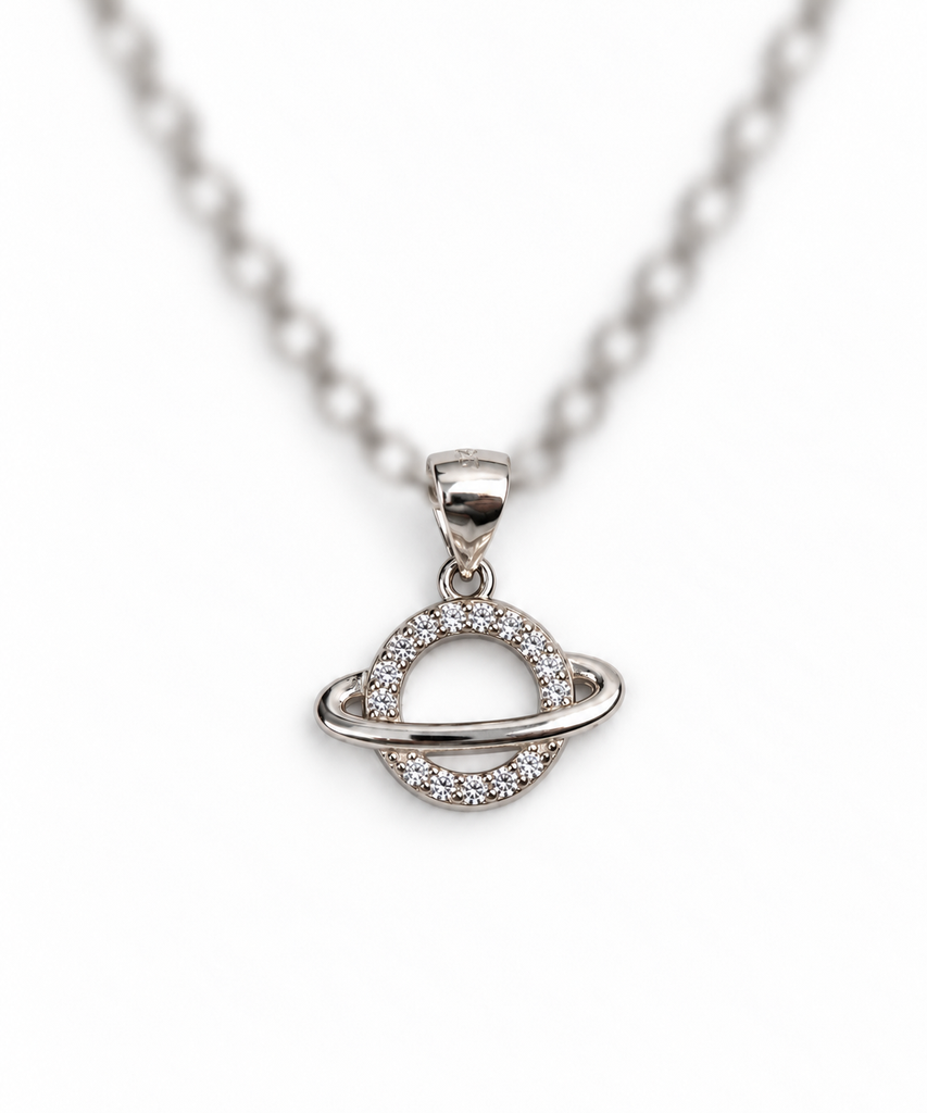 925 sterling silver Saturn pendant with sparkling stones.