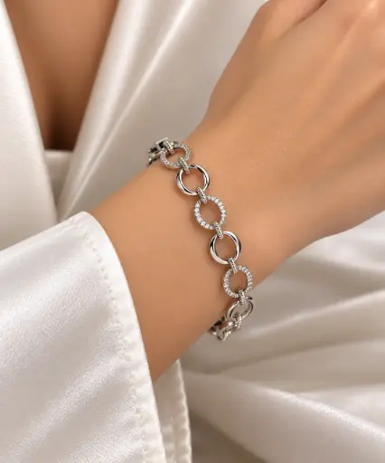 [BRC-006] 925 sterling silver bracelet with polished and white stone-set oval links.